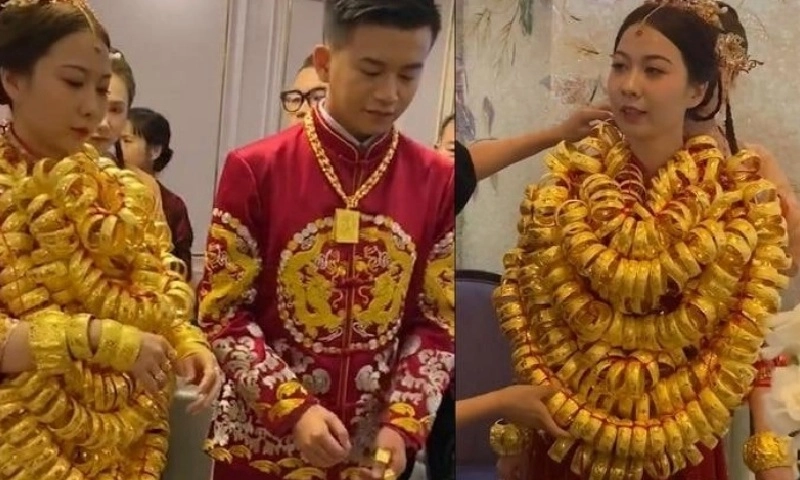 Sự thực đằng sau bức hình cô dâu Trung Quốc phủ kín vàng trên người trong lễ cưới